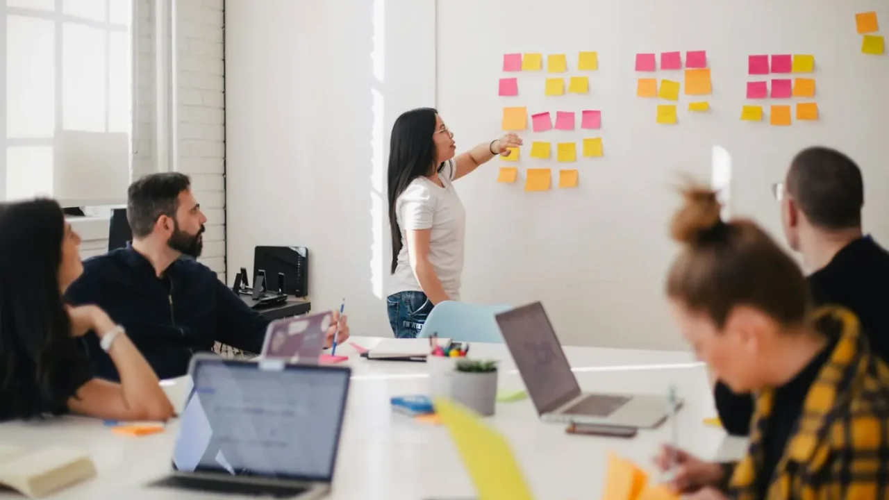 Team gathered around a table during a working meeting